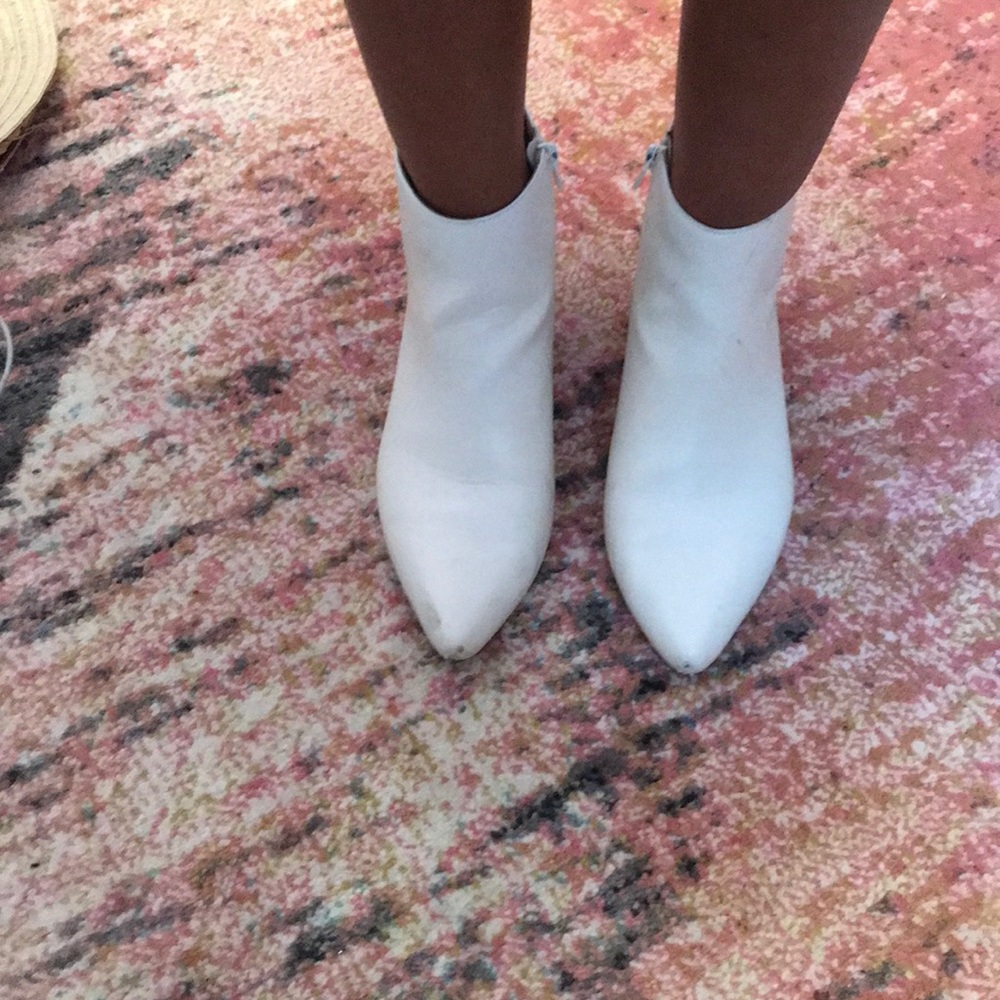 White vegan leather booties.